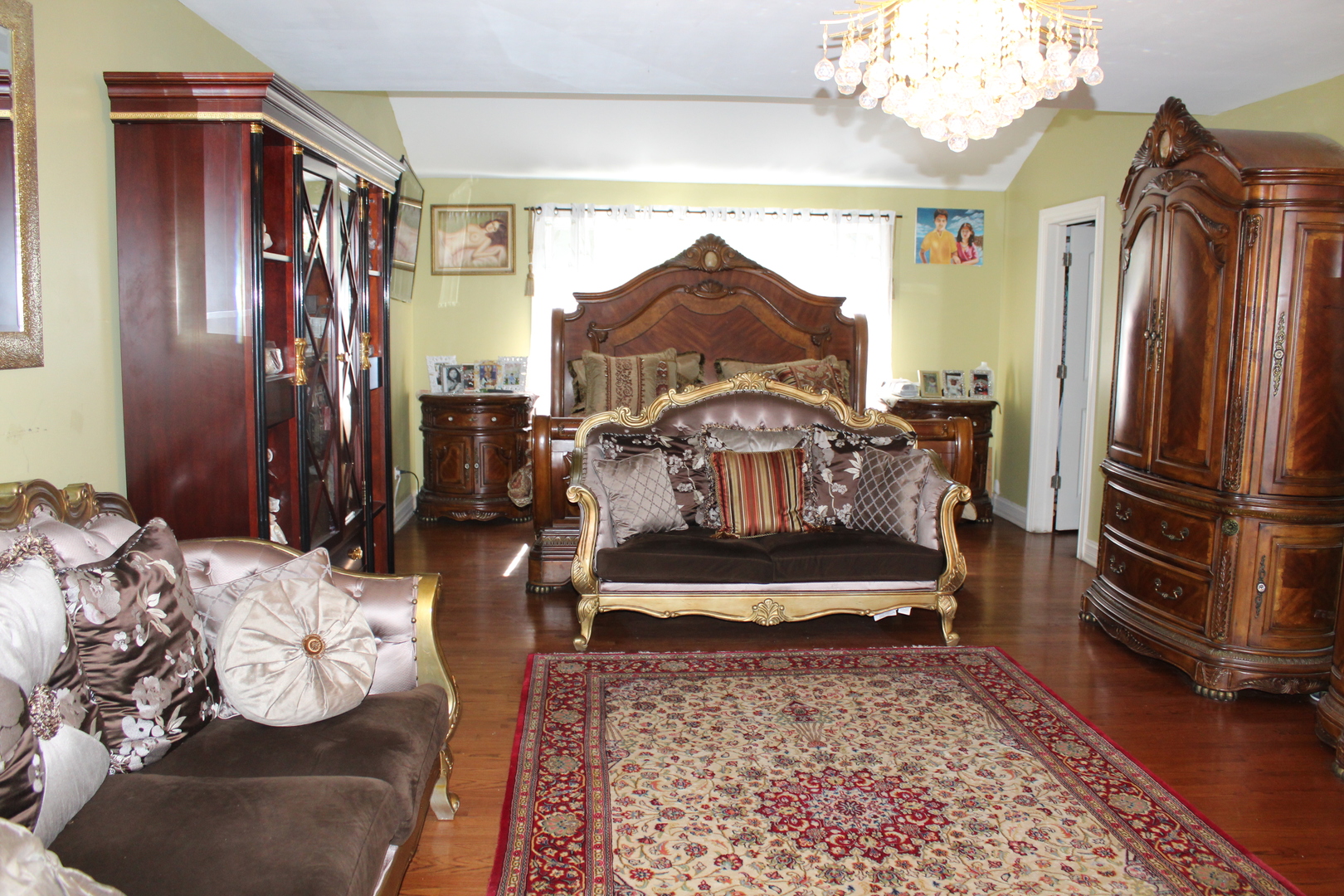 2290 Cedar Court Northbrook, IL 60062 - Photo 34 of 47 a bedroom with furniture a chandelier and wooden floor