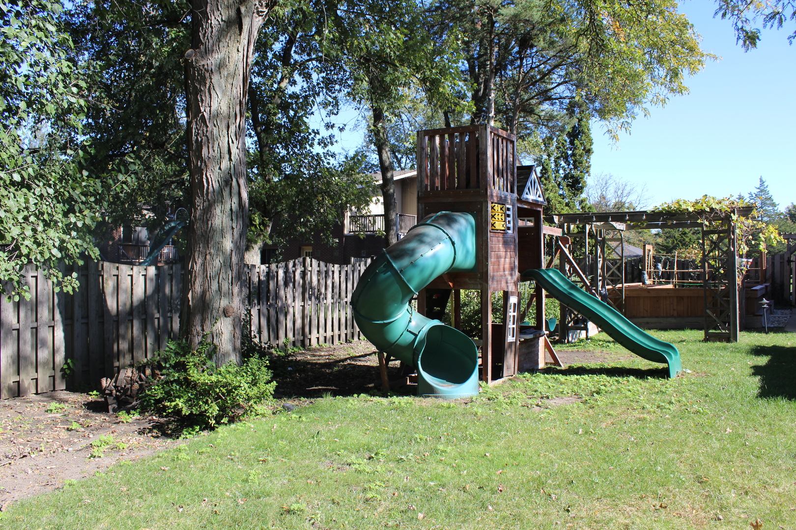 2290 Cedar Court Northbrook, IL 60062 - Photo 40 of 47 a view of a slide with a tree