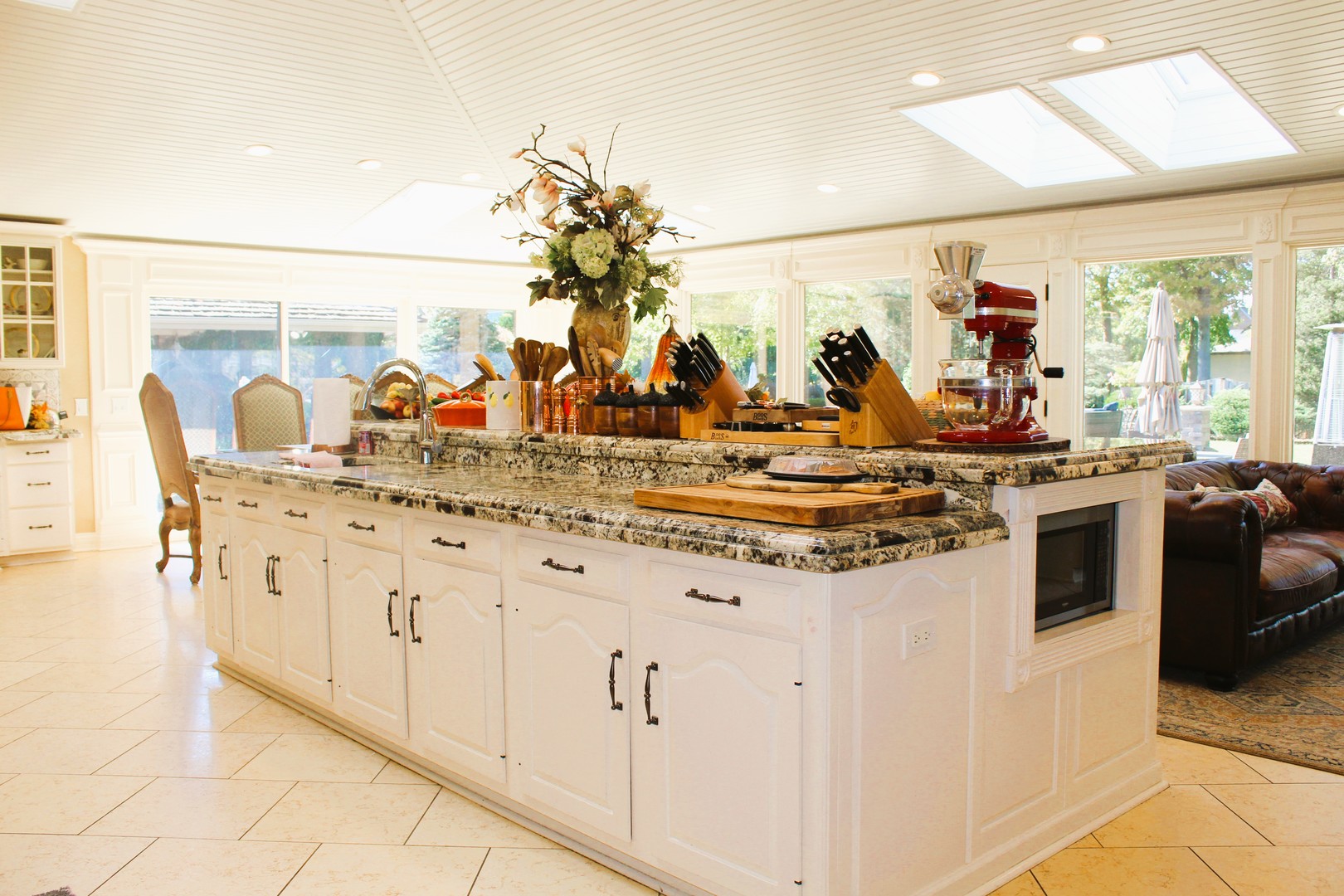2290 Cedar Court Northbrook, IL 60062 - Photo 5 of 47 a view of a kitchen with stainless steel appliances kitchen island granite countertop a sink and cabinets