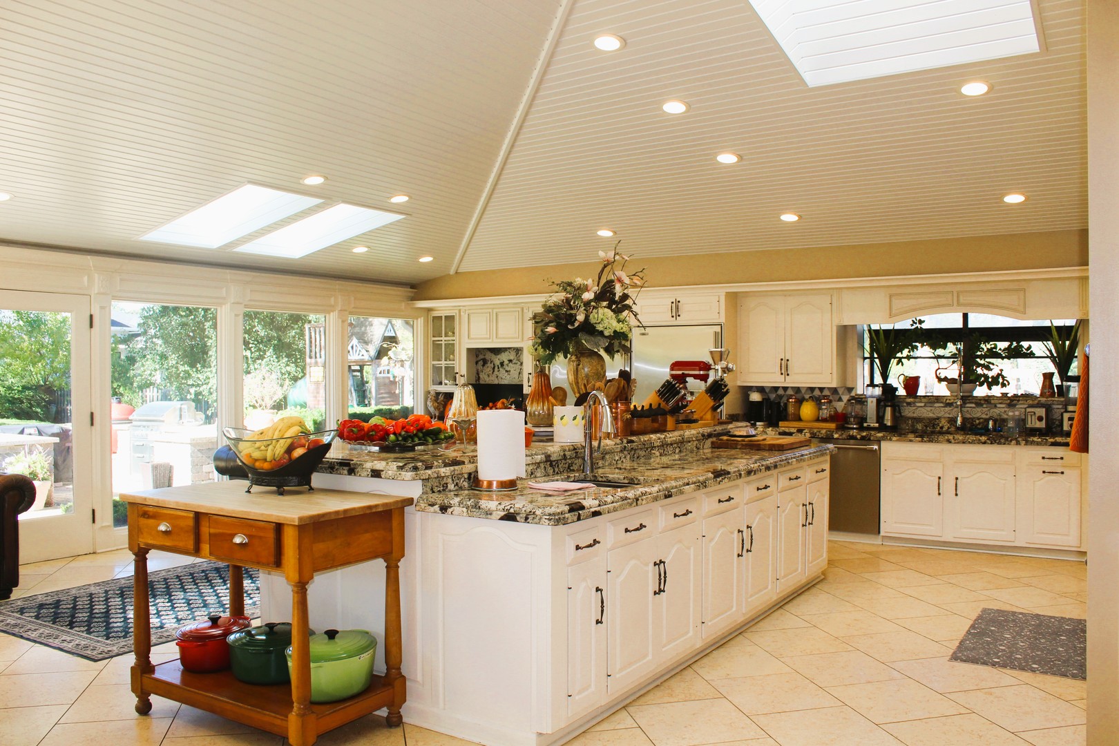 2290 Cedar Court Northbrook, IL 60062 - Photo 6 of 47 a kitchen with counter top space appliances and a large window