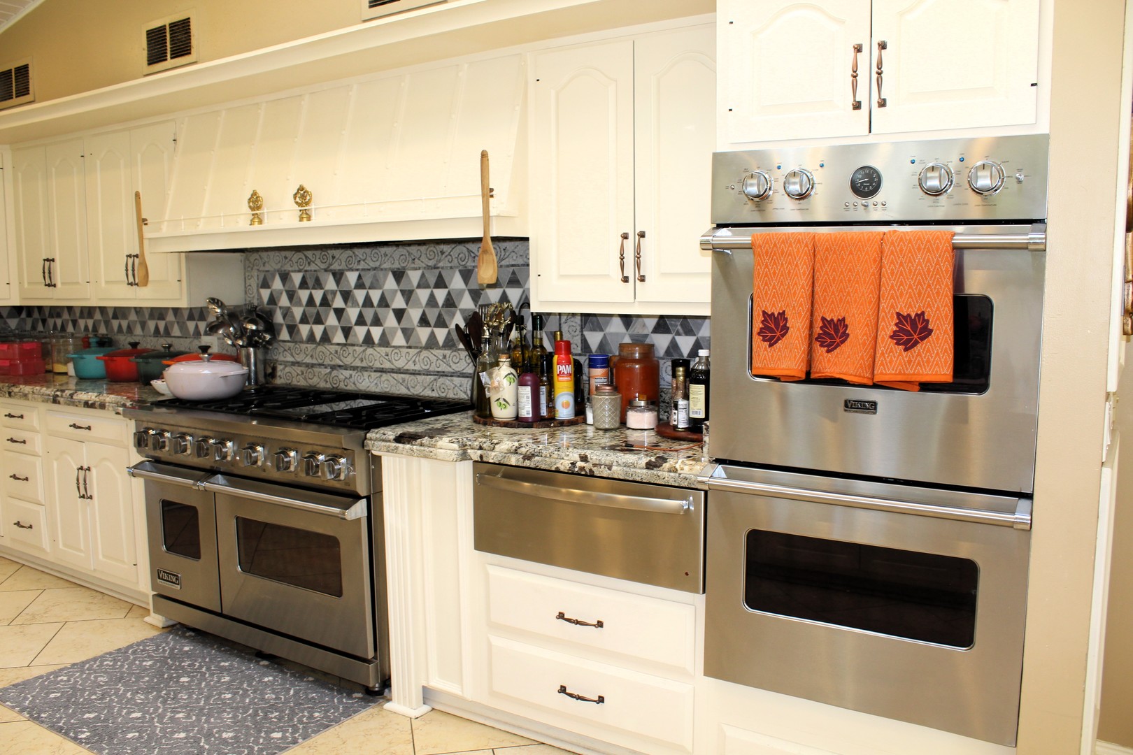 2290 Cedar Court Northbrook, IL 60062 - Photo 7 of 47 a kitchen with stainless steel appliances granite countertop a stove and a microwave