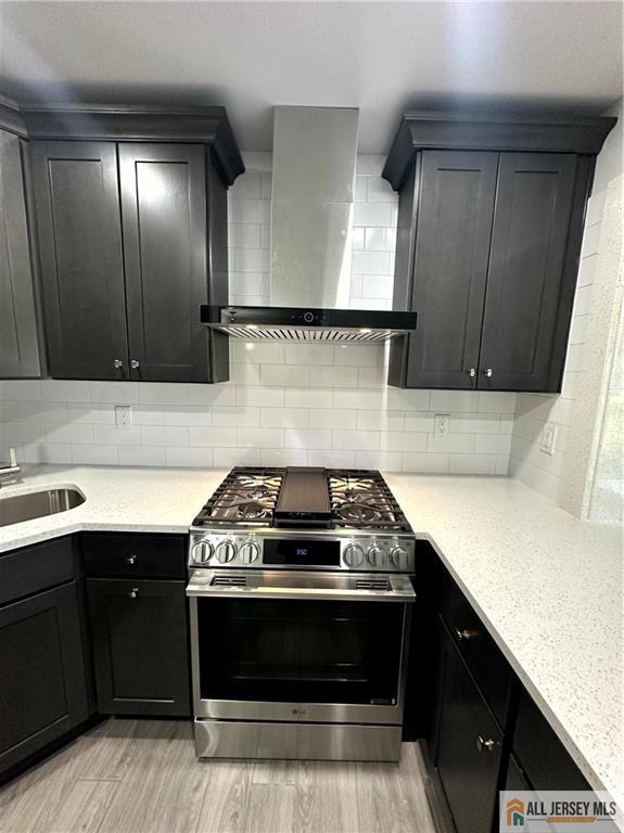 4204 Hana Road Edison, NJ 08817 - Photo 11 of 48 a stove top oven sitting inside of a kitchen