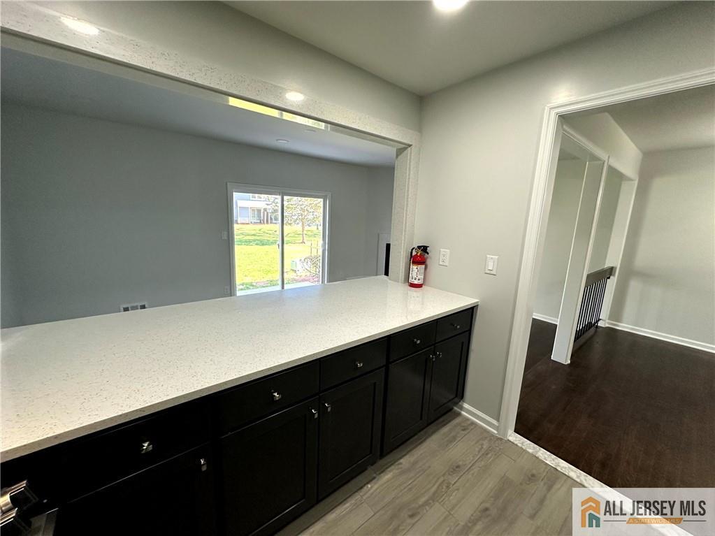 4204 Hana Road Edison, NJ 08817 - Photo 16 of 48 a kitchen with a sink and cabinets