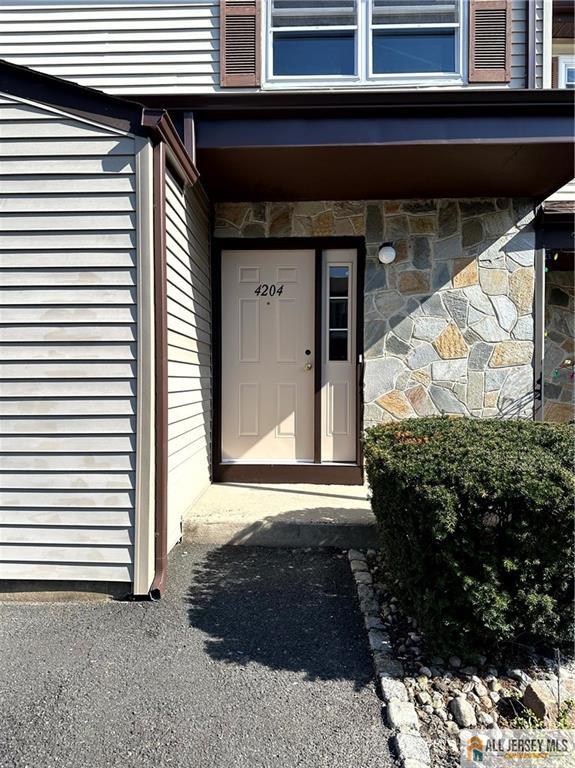 4204 Hana Road Edison, NJ 08817 - Photo 2 of 48 a front view of a house with a yard