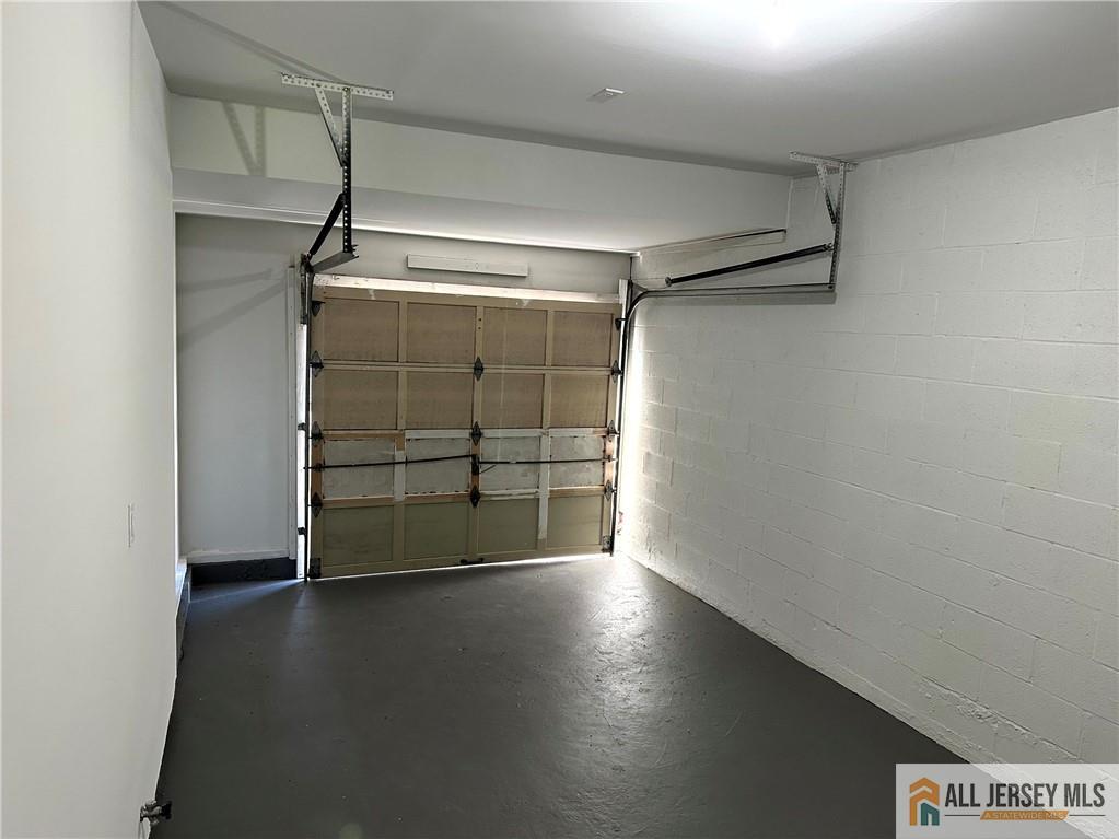 4204 Hana Road Edison, NJ 08817 - Photo 23 of 48 a view of a store room with wooden floor