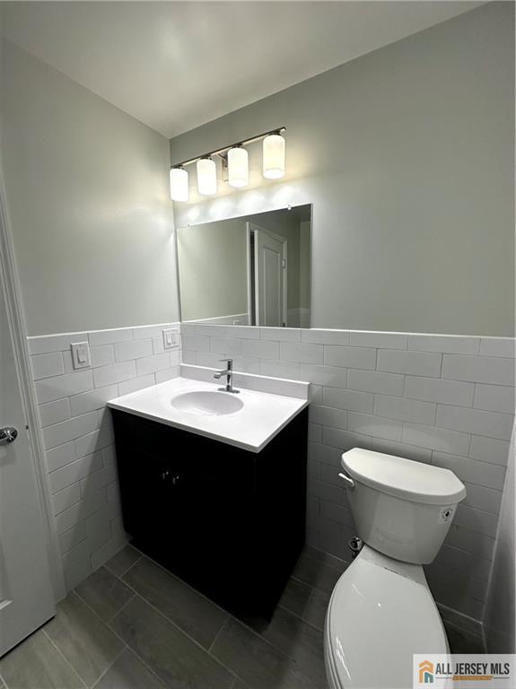 4204 Hana Road Edison, NJ 08817 - Photo 41 of 48 a bathroom with a sink and a toilet