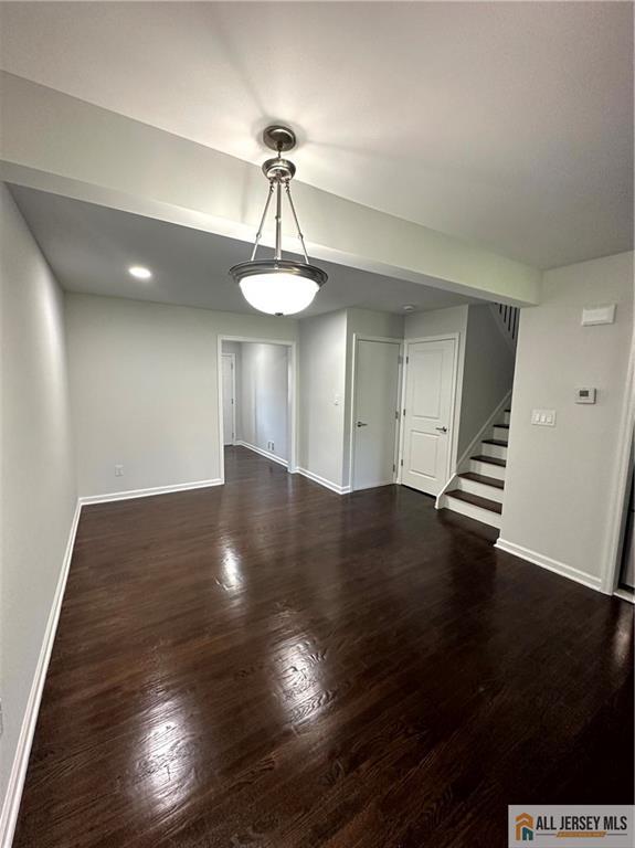 4204 Hana Road Edison, NJ 08817 - Photo 7 of 48 a view of an empty room with wooden floor