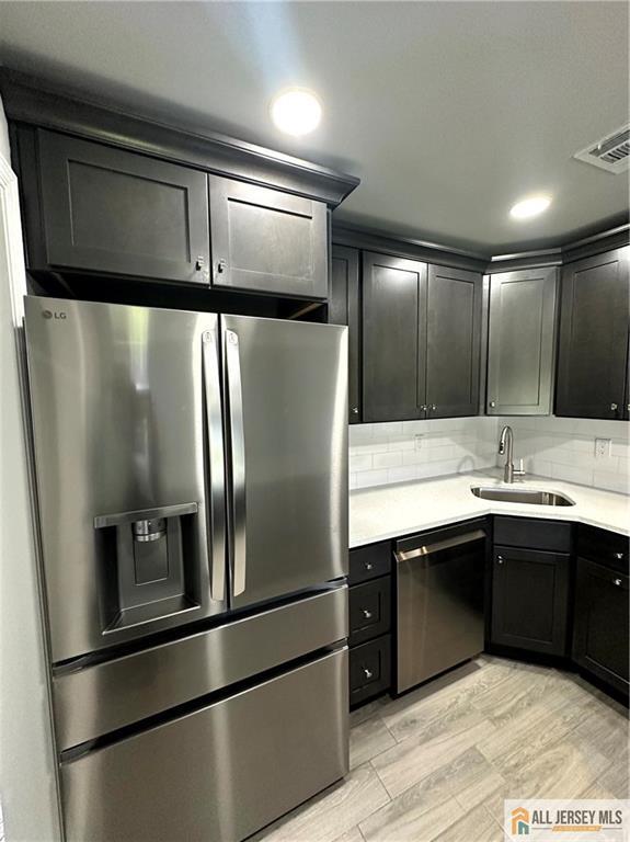 4204 Hana Road Edison, NJ 08817 - Photo 8 of 48 a kitchen with stainless steel appliances granite countertop a refrigerator and a sink