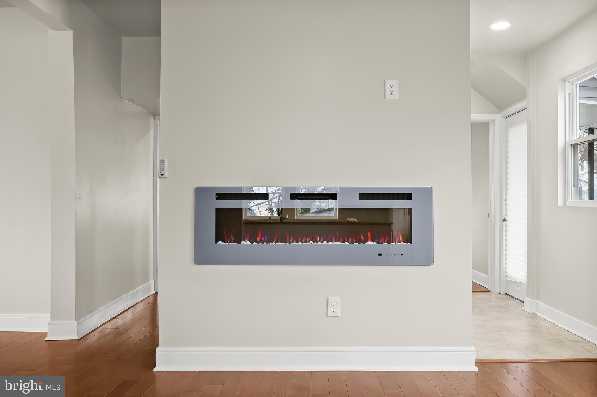 5403 Hamlet Avenue Baltimore, MD 21214 - Photo 24 of 57 Family Room with electric fireplace