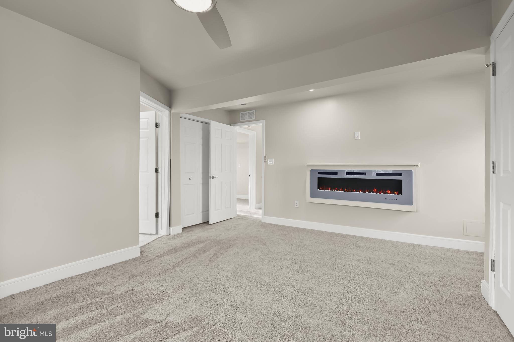 5403 Hamlet Avenue Baltimore, MD 21214 - Photo 42 of 57 Primary Bedroom with electric fireplace