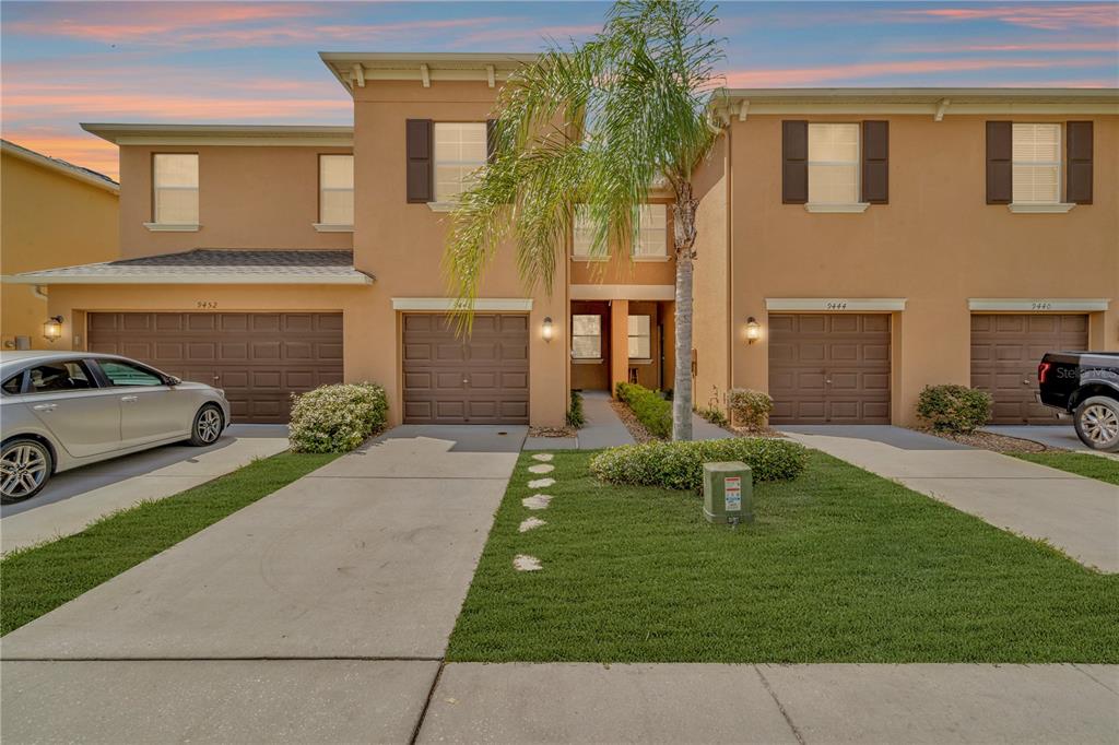 9448 Trumpet Vine Loop Trinity, FL 34655 - Photo 1 of 1 a house view with a garden space