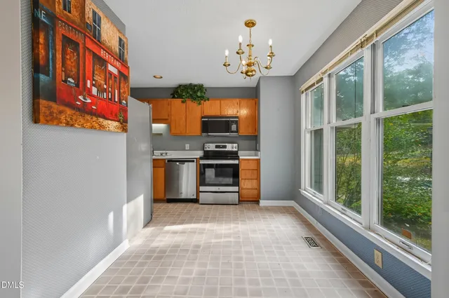 a view of a park with iron fence