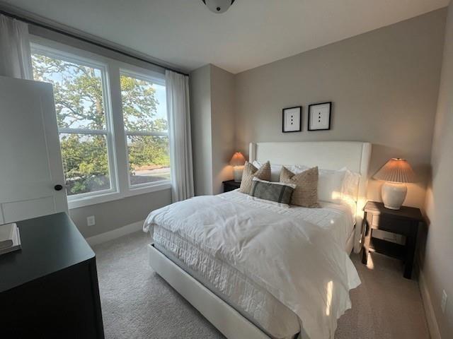 1416 Hazy Way Street Southeast, Unit 317 Atlanta, GA 30315 - Photo 9 of 20 a bedroom with a bed and a window