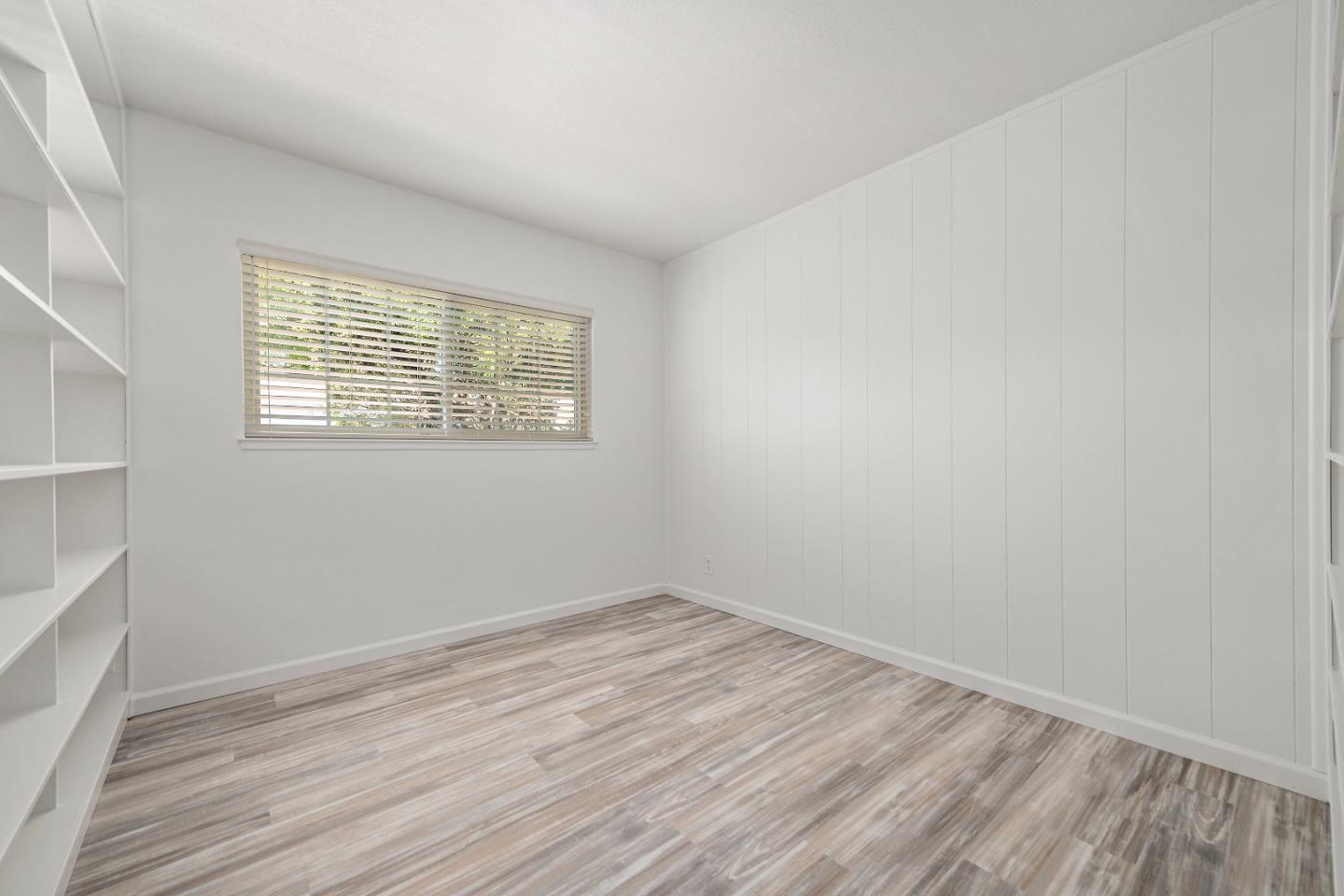 929 Maclay Drive San Jose, CA 95123 - Photo 12 of 23 wooden floor in an empty room with a window