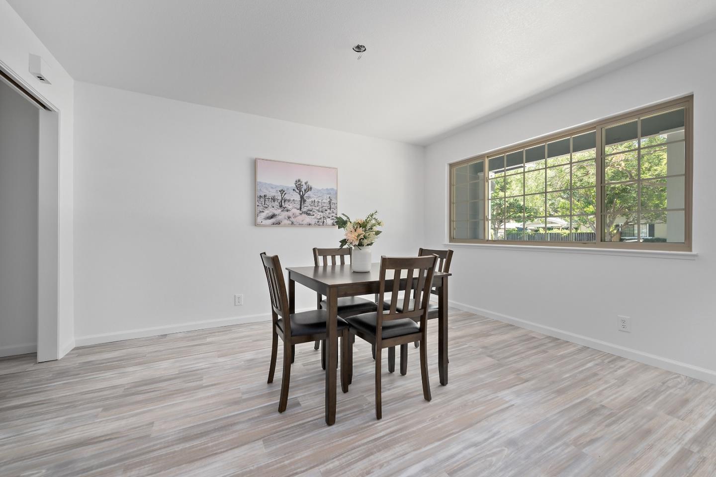 929 Maclay Drive San Jose, CA 95123 - Photo 6 of 23 a dining room with furniture and wooden floor