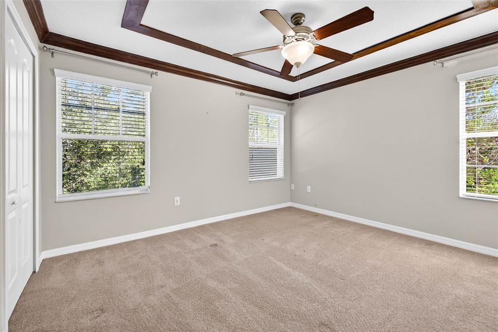 31253 Claridge Place Wesley Chapel, FL 33543 - Photo 23 of 37 a view of an empty room with a window