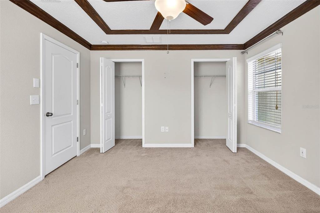 31253 Claridge Place Wesley Chapel, FL 33543 - Photo 26 of 37 an empty room with windows