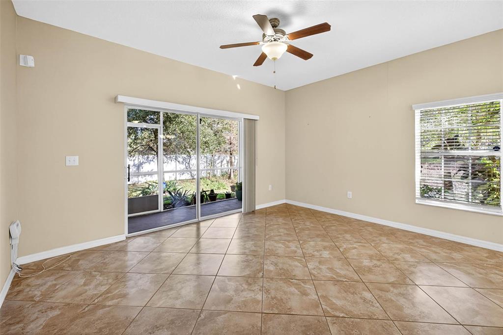 31253 Claridge Place Wesley Chapel, FL 33543 - Photo 8 of 37 a view of an empty room with a window