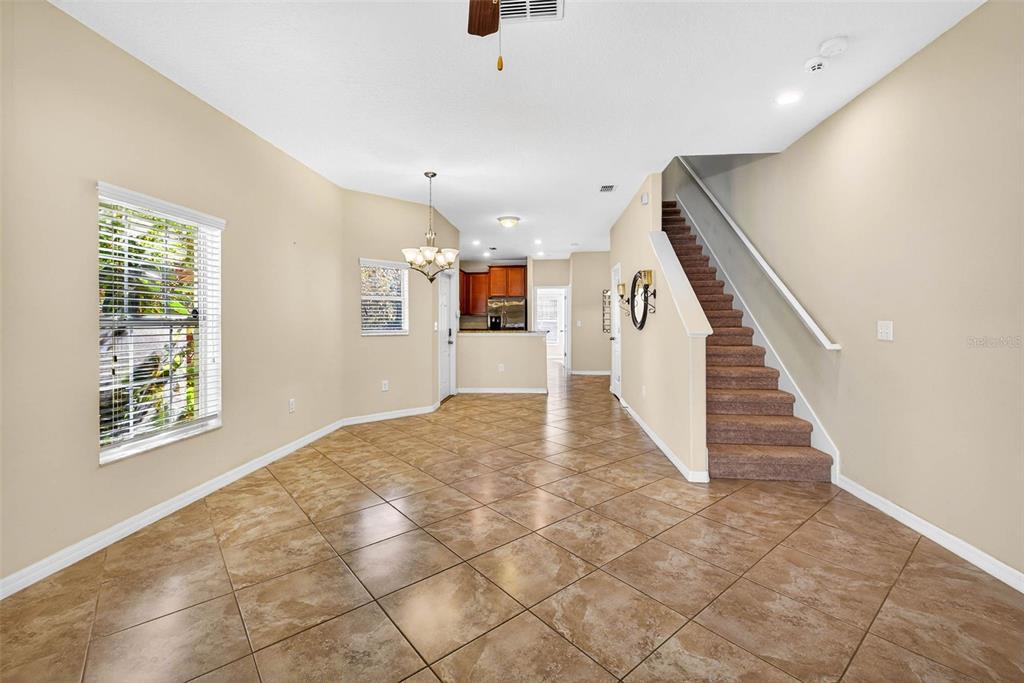 31253 Claridge Place Wesley Chapel, FL 33543 - Photo 9 of 37 a view of an entryway with wooden floor