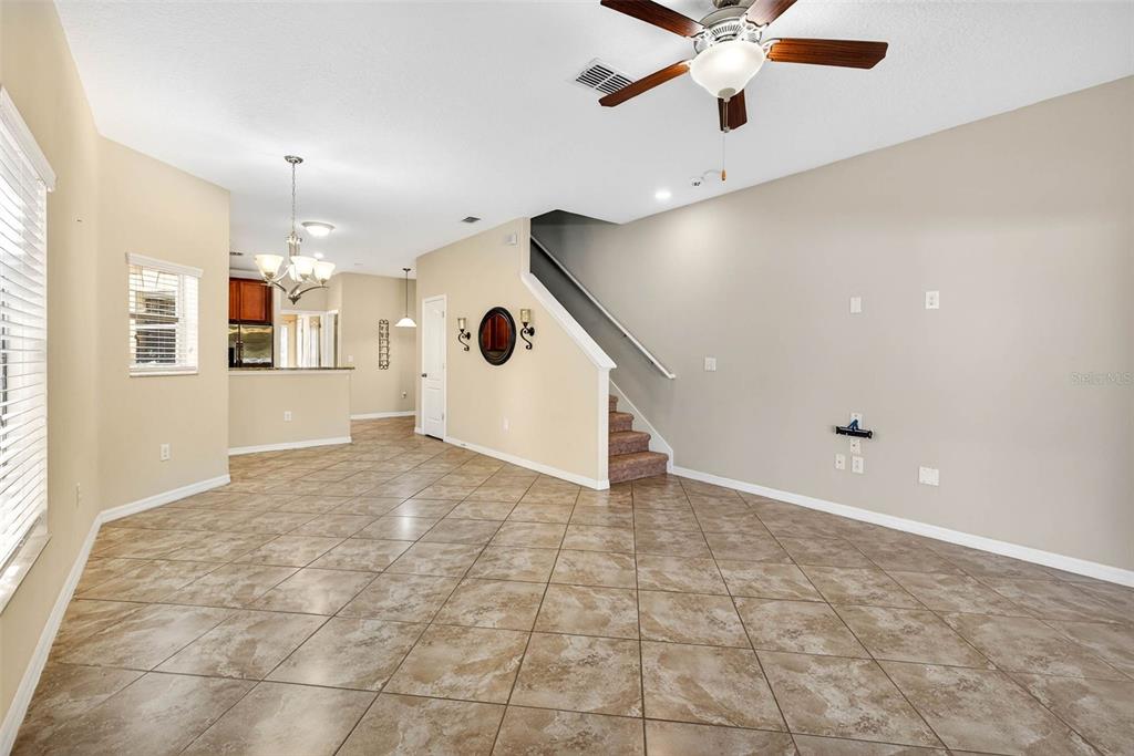 31253 Claridge Place Wesley Chapel, FL 33543 - Photo 10 of 37 a view of a livingroom with a ceiling fan and window
