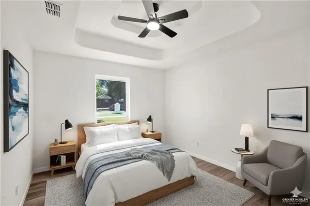 a bedroom with bed and a couch