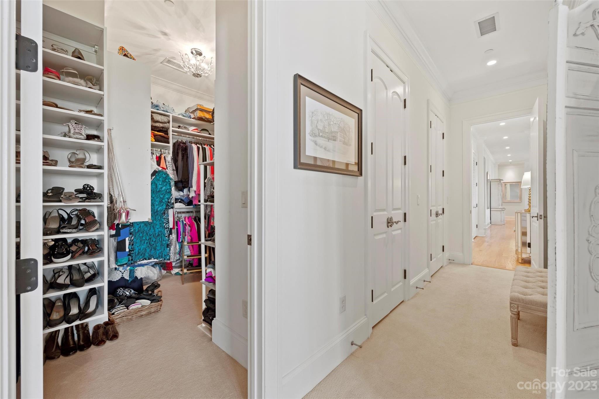 2823 Providence Road, Unit 174 Charlotte, NC 28211 - Photo 16 of 38 a view of walk in closet with clothes and shoes