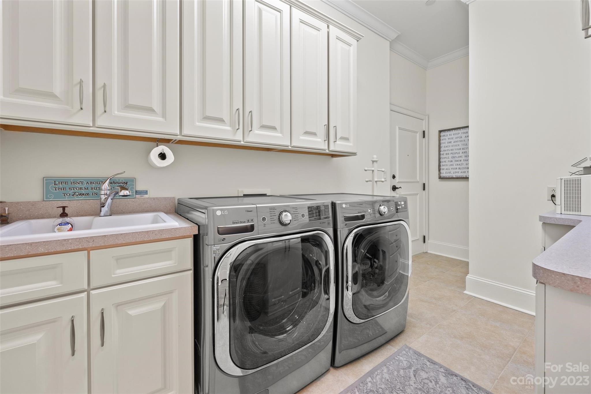 2823 Providence Road, Unit 174 Charlotte, NC 28211 - Photo 21 of 38 a utility room with dryer and washer