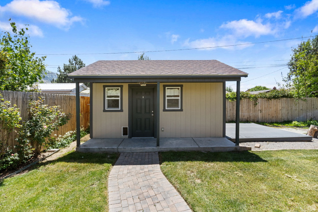 576 East 3950 North Provo, UT 84604 - Photo 40 of 47 Detached accessory structure with a covered porch, durable siding, and a composition shingle roof