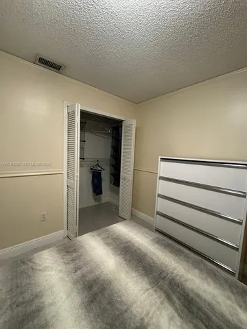 a view of room with hardwood