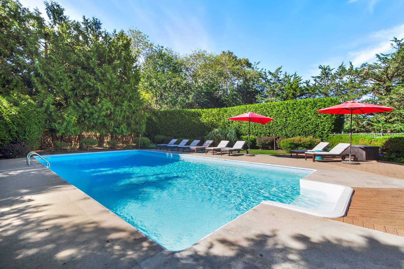 27 Tuthill Lane Remsenburg, NY 11960 - Photo 16 of 18 an outdoor space with pool and furniture