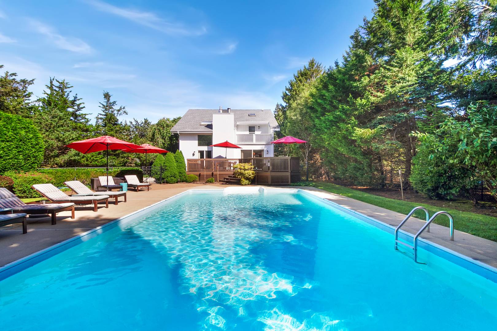 27 Tuthill Lane Remsenburg, NY 11960 - Photo 17 of 18 a view of a backyard with swimming pool