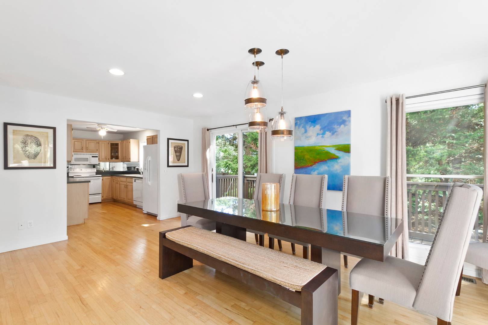 27 Tuthill Lane Remsenburg, NY 11960 - Photo 4 of 18 a living room with furniture and a table