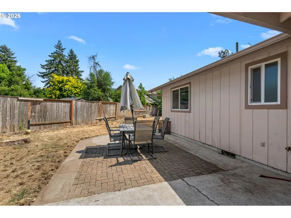 a view of a outdoor space with a patio
