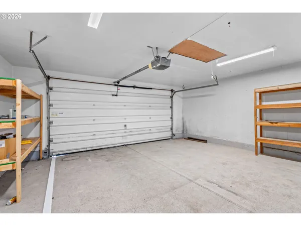 a view of an empty room with windows