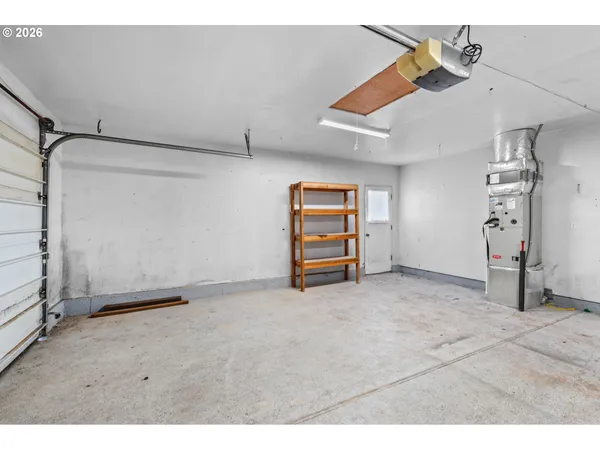 a view of an empty room with windows