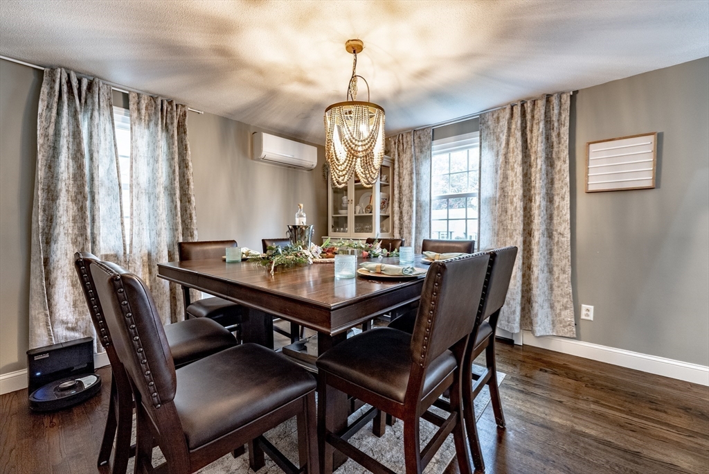24 Rambling Drive Westfield, MA 01085 - Photo 11 of 39 a view of a a dining room with furniture window and wooden floor