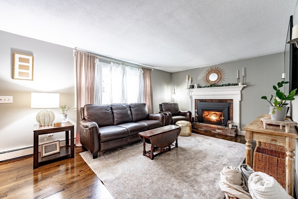 24 Rambling Drive Westfield, MA 01085 - Photo 12 of 39 a living room with furniture and a fireplace