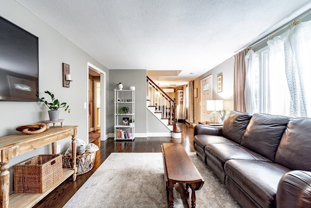 24 Rambling Drive Westfield, MA 01085 - Photo 15 of 39 a living room with furniture and a flat screen tv