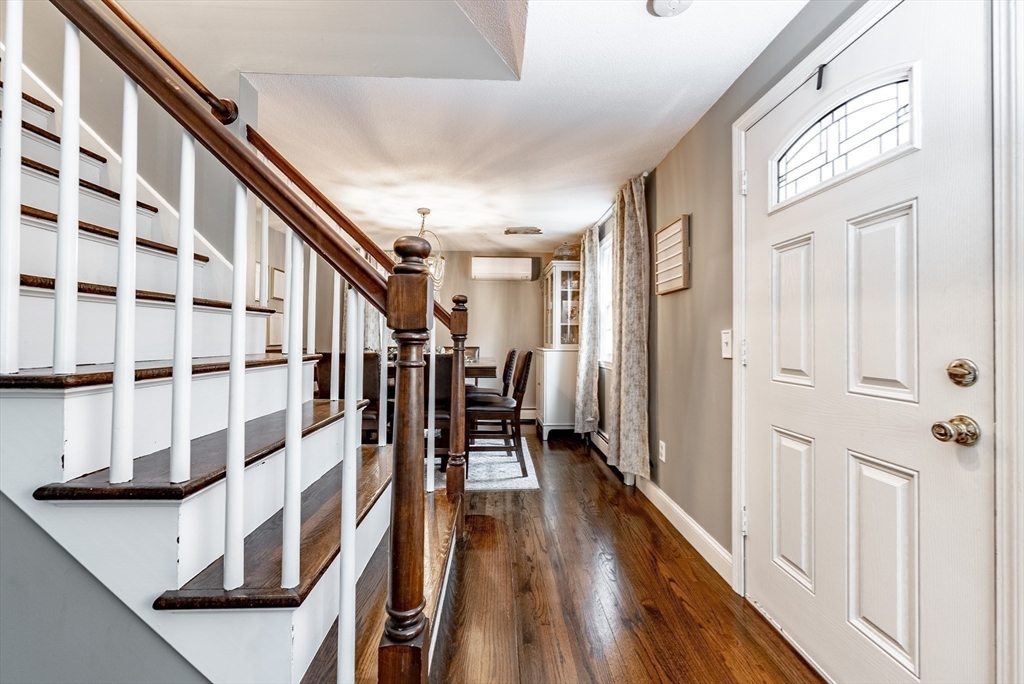 24 Rambling Drive Westfield, MA 01085 - Photo 17 of 39 a view of entryway with wooden floor and stairs