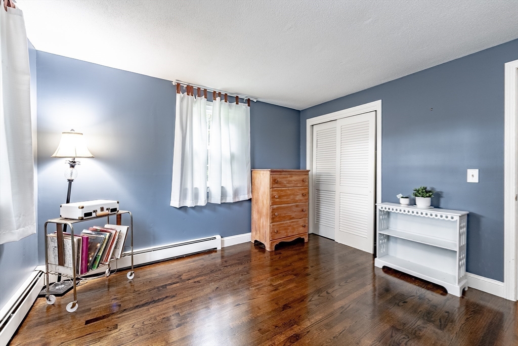 24 Rambling Drive Westfield, MA 01085 - Photo 19 of 39 a view of room with furniture and wooden floor