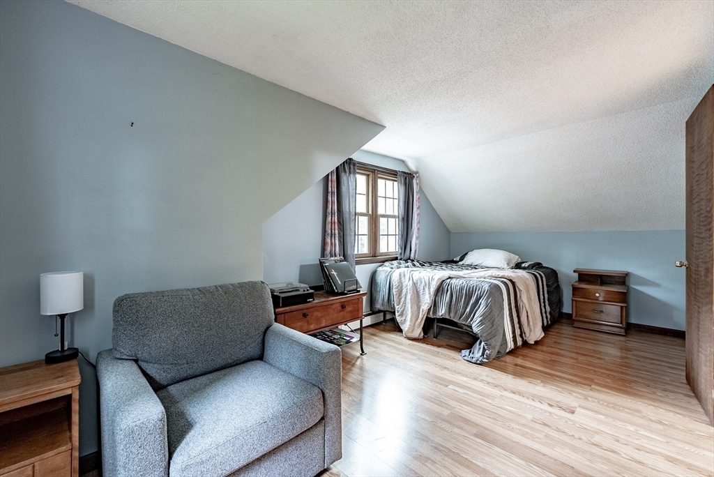 24 Rambling Drive Westfield, MA 01085 - Photo 22 of 39 a bedroom with a bed and a couch