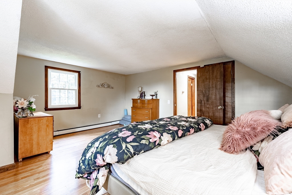 24 Rambling Drive Westfield, MA 01085 - Photo 27 of 39 a bedroom with a bed and window