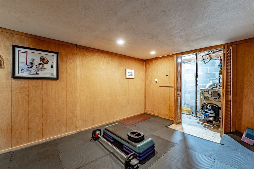 24 Rambling Drive Westfield, MA 01085 - Photo 30 of 39 a living room with hard wood floors and a window