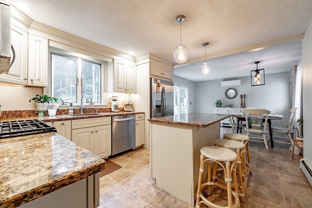 24 Rambling Drive Westfield, MA 01085 - Photo 3 of 39 a kitchen with sink cabinets and window