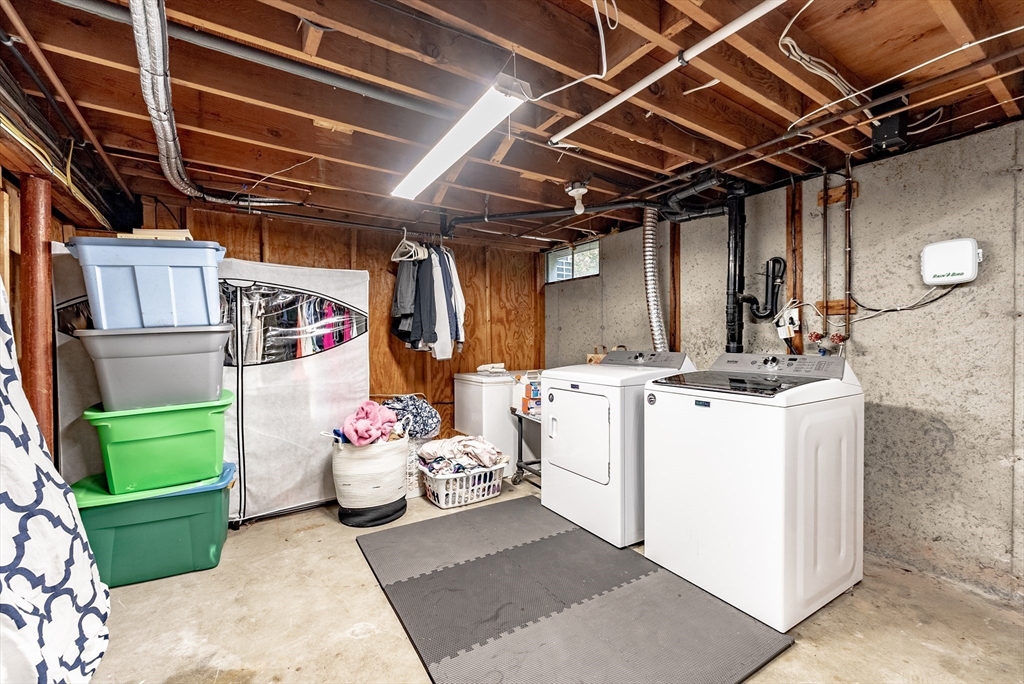 24 Rambling Drive Westfield, MA 01085 - Photo 31 of 39 a storage room with washer and dryer