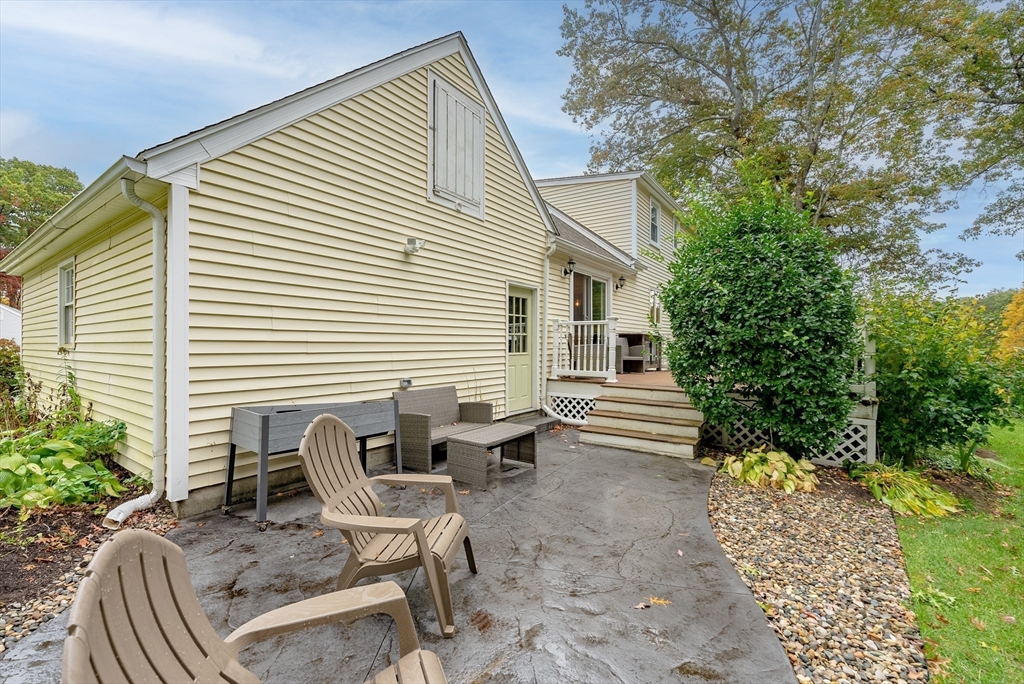 24 Rambling Drive Westfield, MA 01085 - Photo 34 of 39 a view of a patio with a table and chairs and potted plants