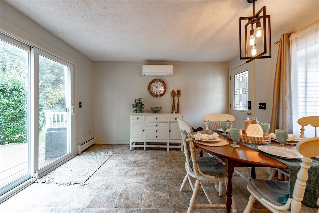 24 Rambling Drive Westfield, MA 01085 - Photo 7 of 39 a view of a dining room with furniture window and outside view