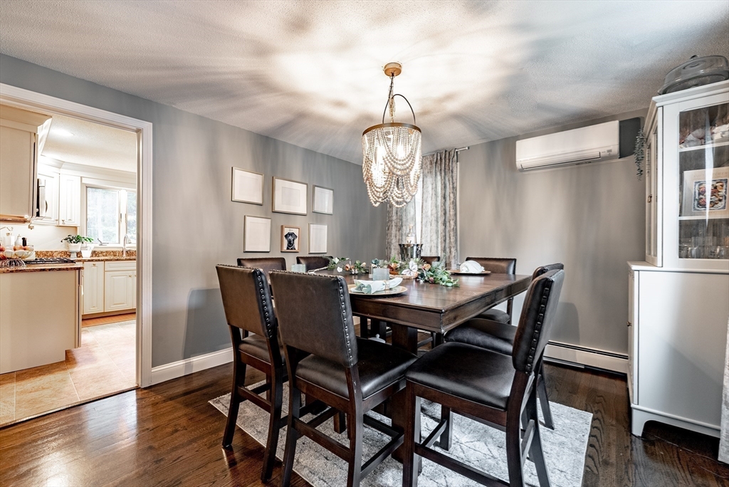 24 Rambling Drive Westfield, MA 01085 - Photo 10 of 39 a view of a dining room with furniture window and wooden floor