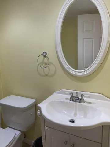a bathroom with a sink and mirror