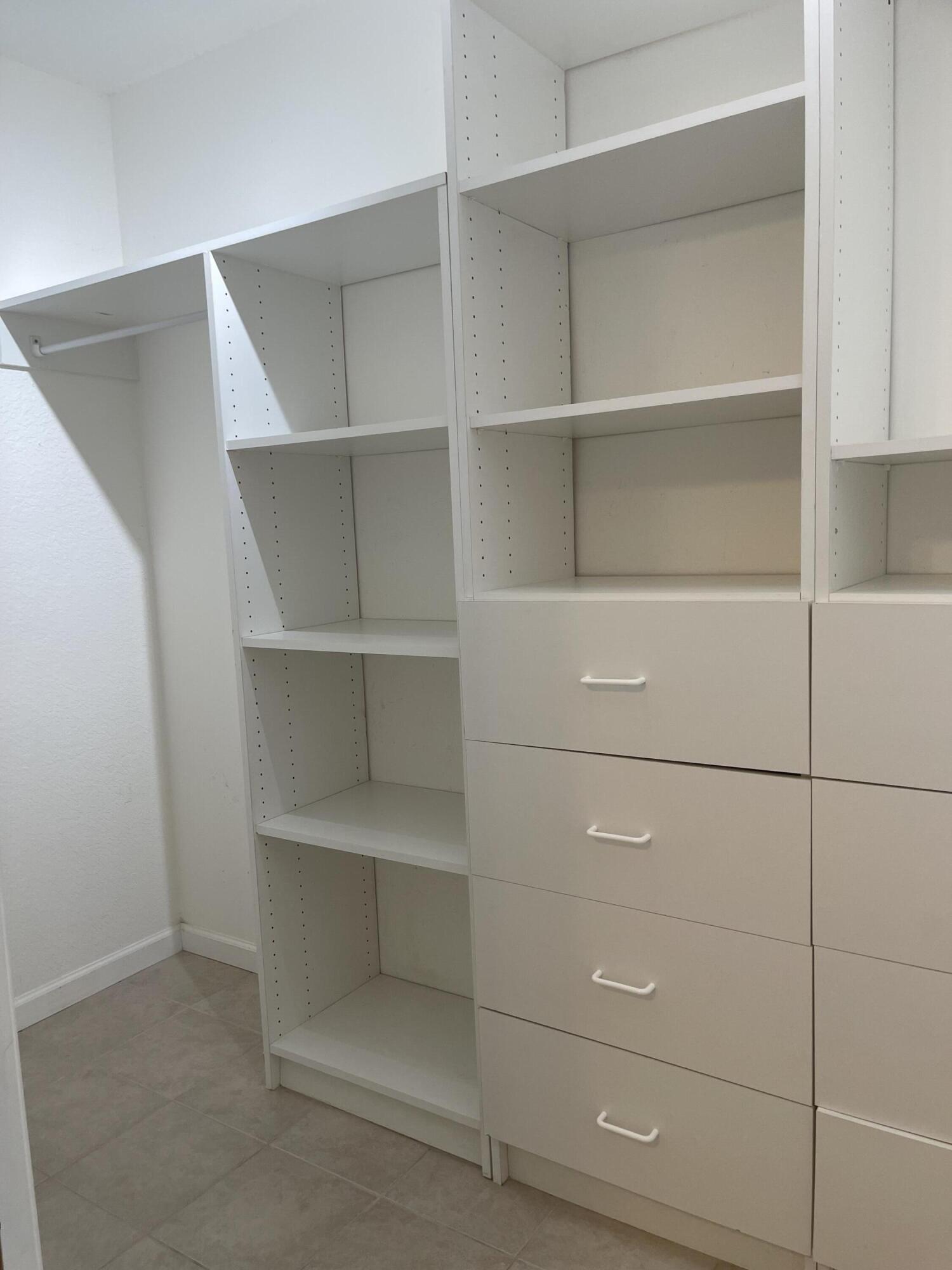 613 6th Lane Palm Beach Gardens, FL 33418 - Photo 8 of 12 a close up view of closet